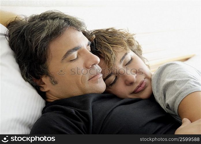 Close-up of a mature couple sleeping