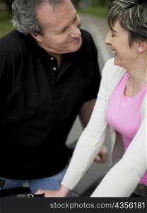 Close-up of a mature couple talking and smiling