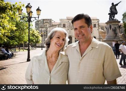 Close-up of a mature man and his mother looking at him and smiling, Santo Domingo, Dominican Republic