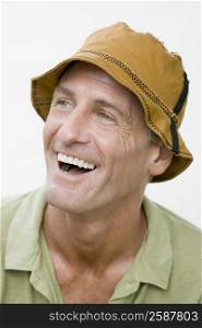 Close-up of a mature man laughing