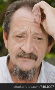 Close-up of a mature man looking serious