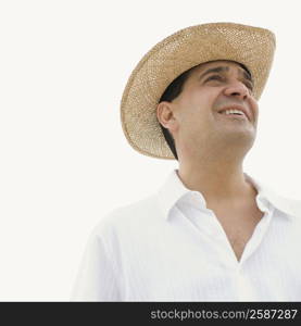 Close-up of a mature man looking up and smiling