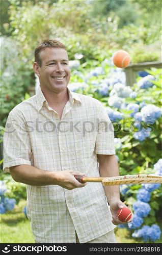Close-up of a mature man playing tennis
