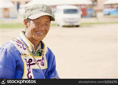 Close-up of a mature man smiling, Inner Mongolia, China