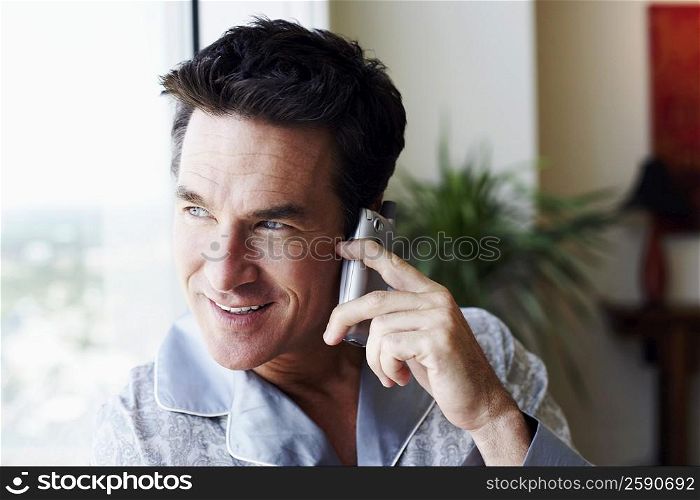 Close-up of a mature man talking on a mobile phone
