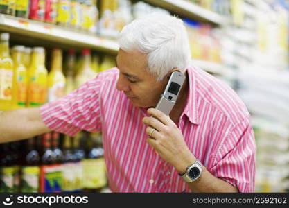 Close-up of a mature man talking on a mobile phone