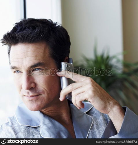 Close-up of a mature man talking on a mobile phone