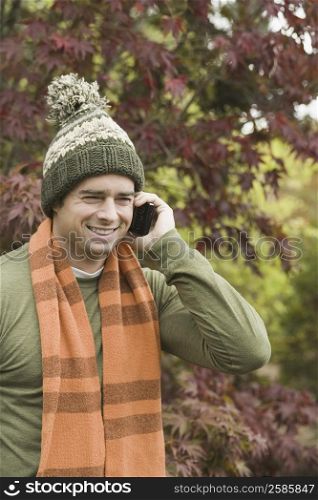 Close-up of a mature man talking on a mobile phone and smiling