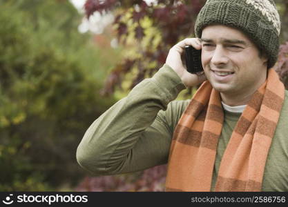 Close-up of a mature man talking on a mobile phone and smiling