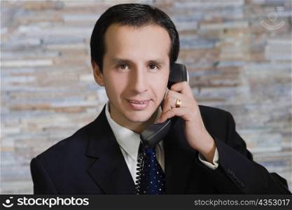 Close-up of a mature man talking on the phone