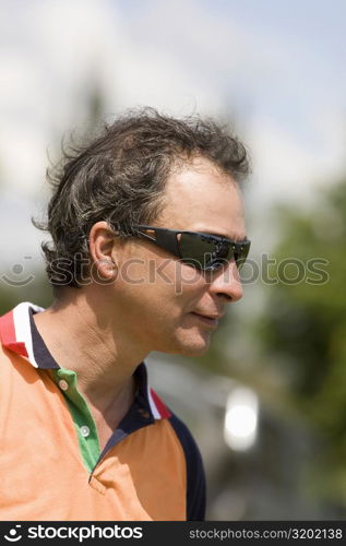 Close-up of a mature man wearing sunglasses