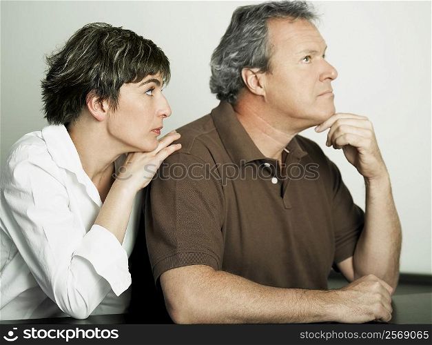 Close-up of a mature woman convincing her husband