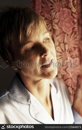 Close-up of a mature woman looking away