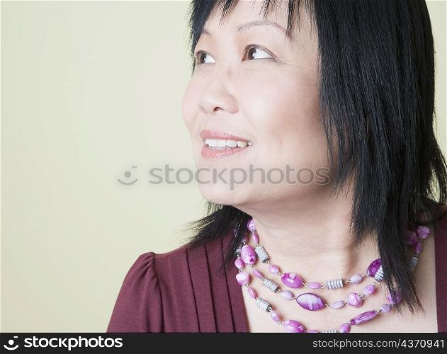 Close-up of a mature woman looking away