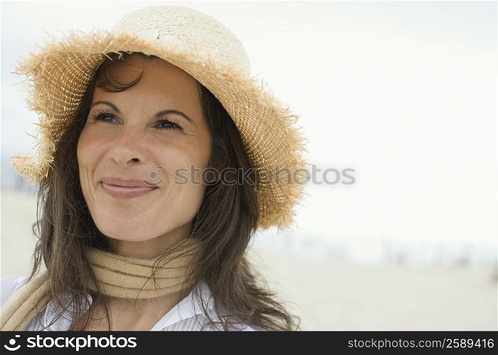 Close-up of a mature woman looking away and smiling