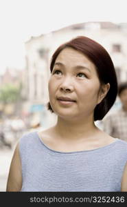 Close-up of a mature woman looking up