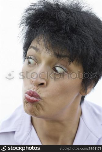 Close-up of a mature woman puckering