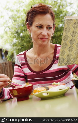 Close-up of a mature woman reading