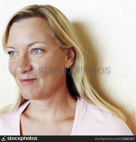 Close-up of a mature woman smirking
