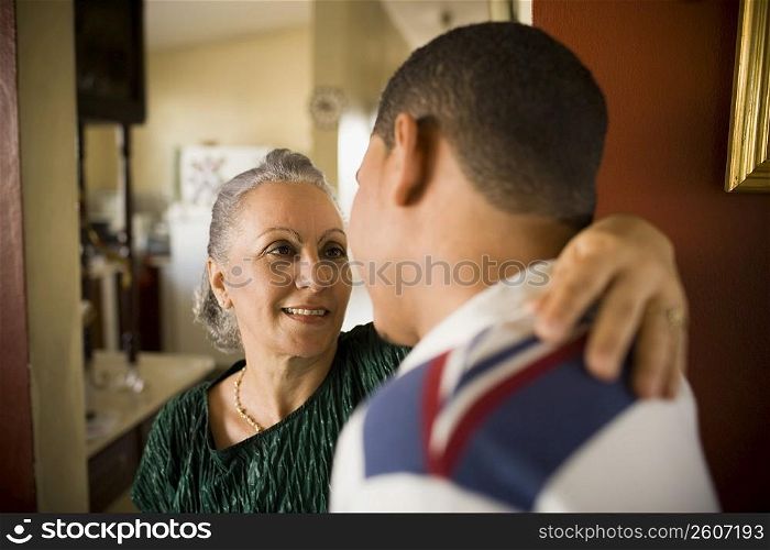 Close-up of a mature woman talking to her grandson