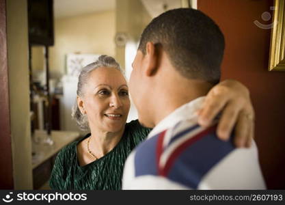 Close-up of a mature woman talking to her grandson