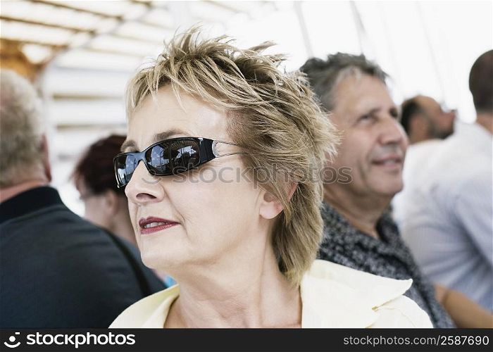 Close-up of a mature woman wearing sunglasses