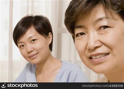 Close-up of a mature woman with her daughter