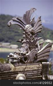 Close-up of a metal dragon sculpture, Roof Guardian, Okasaki Castle, Tokushima, Shikoku, Japan