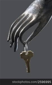 Close-up of a metal sculpture holding a key ring