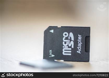 Close-up of a micro SD to SD memory card adapter