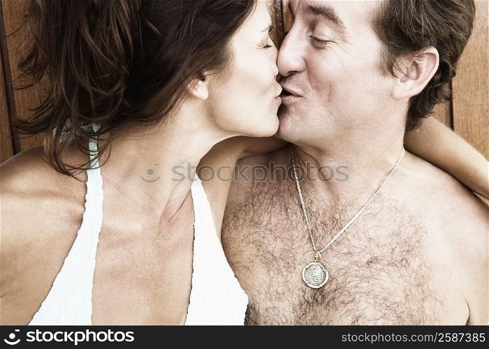 Close-up of a mid adult couple kissing each other