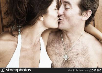 Close-up of a mid adult couple kissing each other