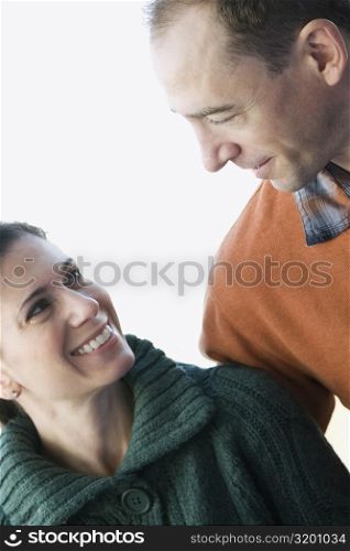 Close-up of a mid adult couple smiling