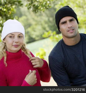 Close-up of a mid adult man and a young woman