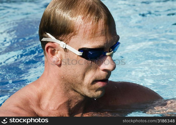 Close-up of a mid adult man in a swimming pool