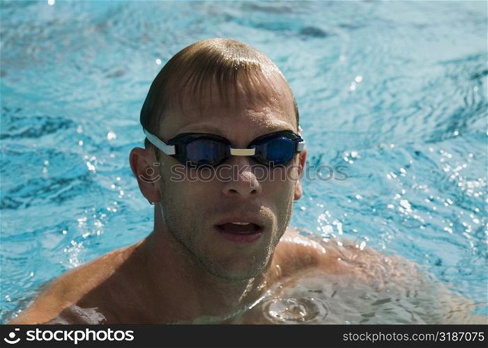 Close-up of a mid adult man in a swimming pool
