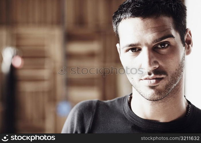 Close-up of a mid adult man looking serious