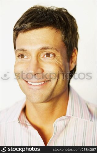 Close-up of a mid adult man smiling