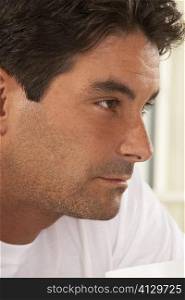 Close-up of a mid adult man thinking
