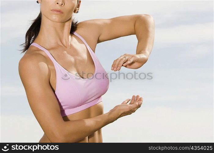 Close-up of a mid adult woman practicing martial arts