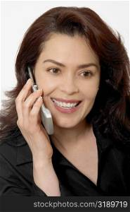 Close-up of a mid adult woman using a mobile phone
