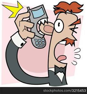 Close-up of a mobile phone biting a man&acute;s ear