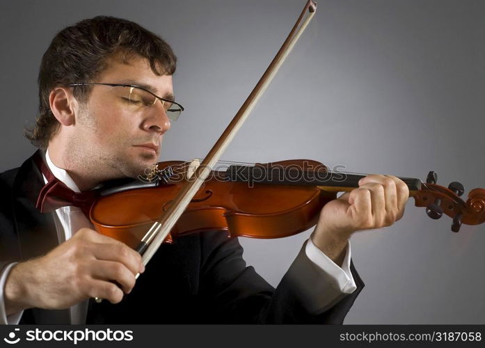 Close-up of a musician playing a violin