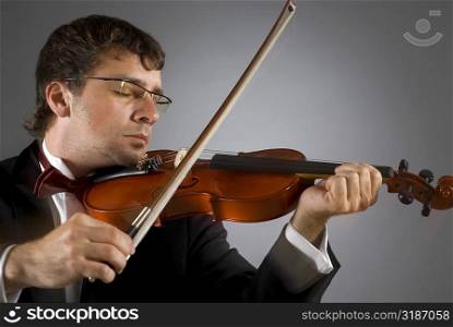 Close-up of a musician playing a violin