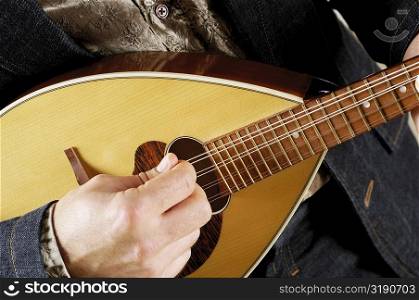Close-up of a musician playing the banjo