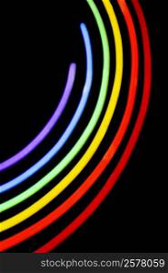 Close-up of a neon illuminating gay pride symbol