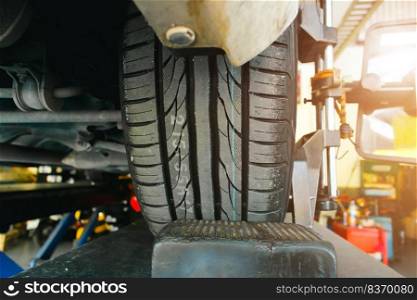 Close up of a new tire tread of a car in a auto tire shop, automobile maintenance service business concept