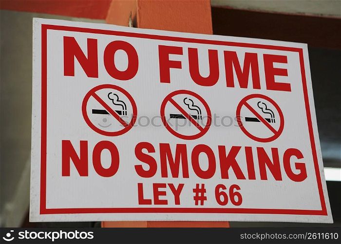 Close-up of a No Smoking signboard