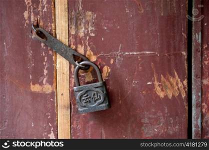 Close-up of a padlock at the door, Zhouzhuang, Jiangsu Province, China