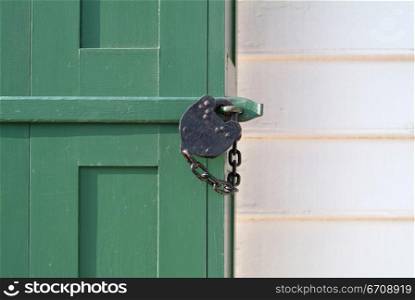 Close-up of a padlock on a door